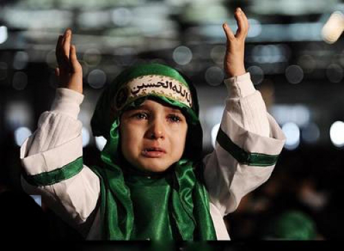 A child moarning for Emam Hussein